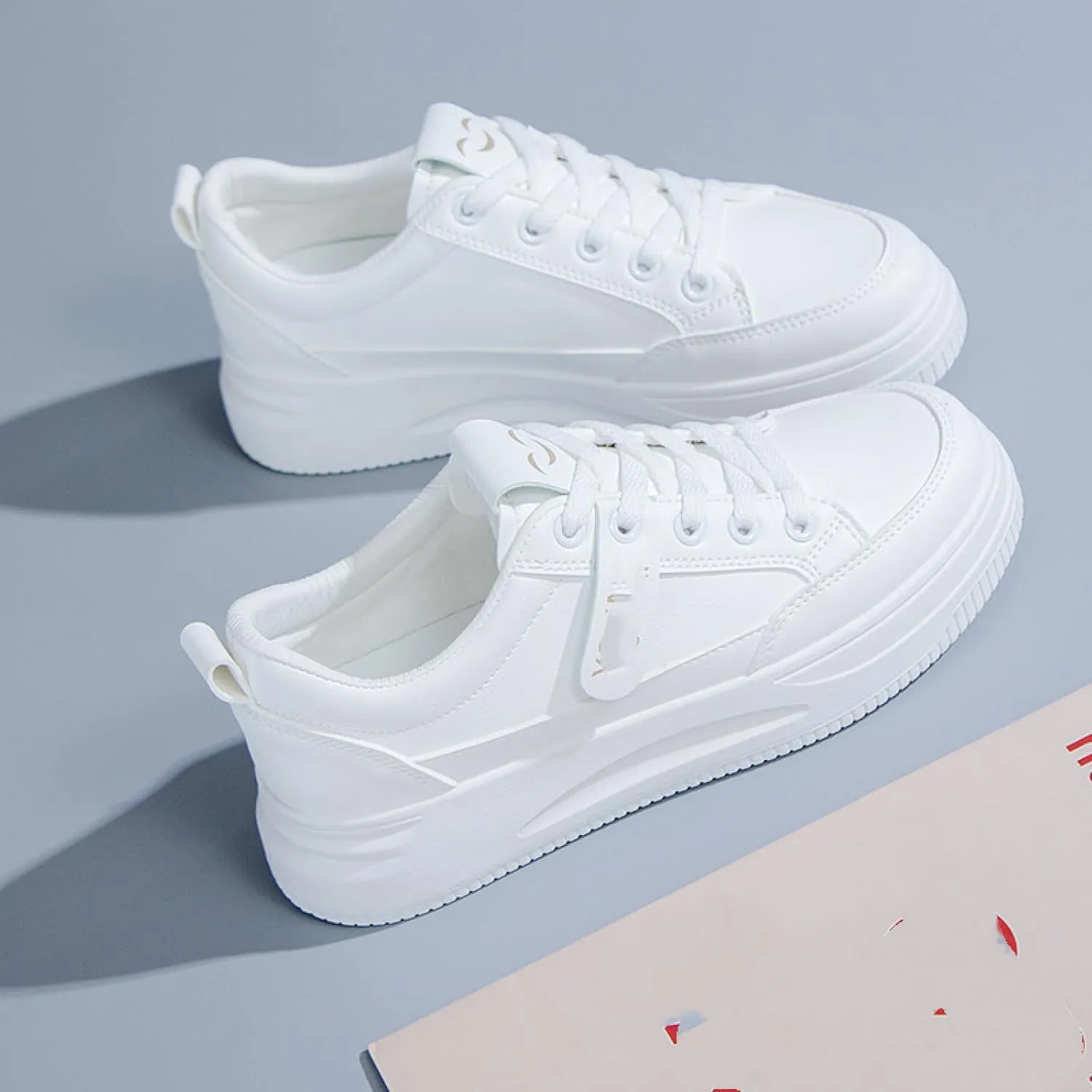 Small White Shoes and Sports Board Shoes