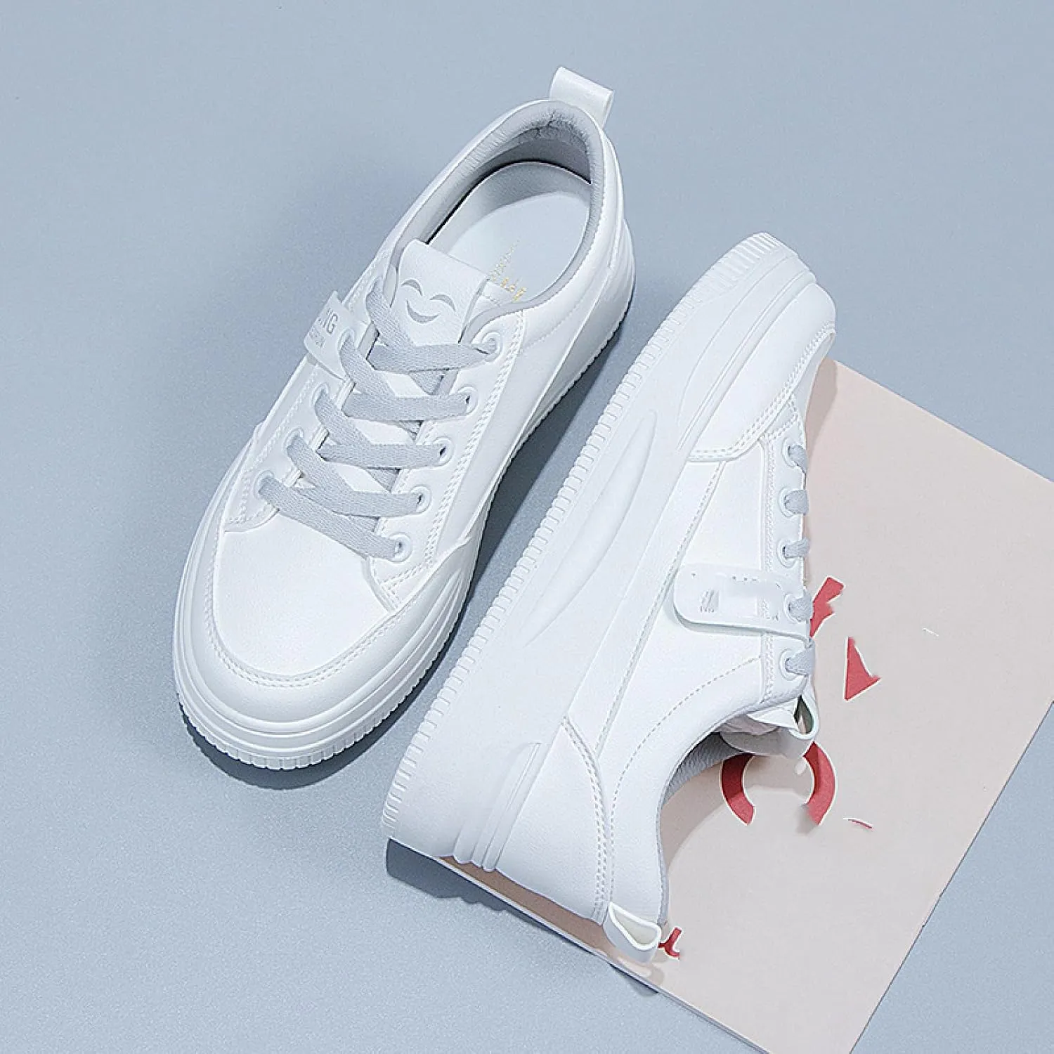 Small White Shoes and Sports Board Shoes